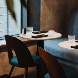 a room with tables and chairs